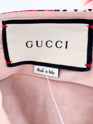 Gucci Silk trousers with bold floral print, 46