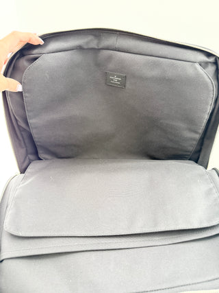 Louis Vuitton briefcase crafted in signature taiga leather featuring top zip closure, front slip pocket, and rolled leather handles
