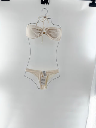 la sirene bikini set featuring halter-style triangle silhouette with gathered detailing at the bust and matching low-rise bikini bottom and matching midi skirt with an adjustable drawstring affect across the front, S