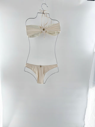 la sirene bikini set featuring halter-style triangle silhouette with gathered detailing at the bust and matching low-rise bikini bottom and matching midi skirt with an adjustable drawstring affect across the front, S