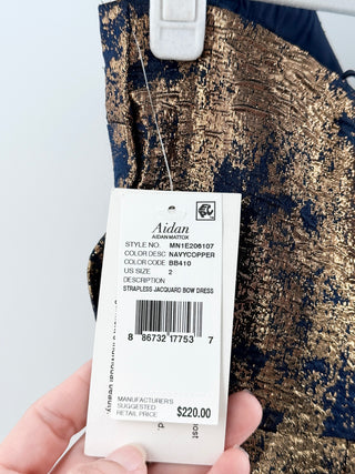 Aidan Mattox strapless mini dress with a textured, high-shine finish featuring oversized bow detail at front, 2