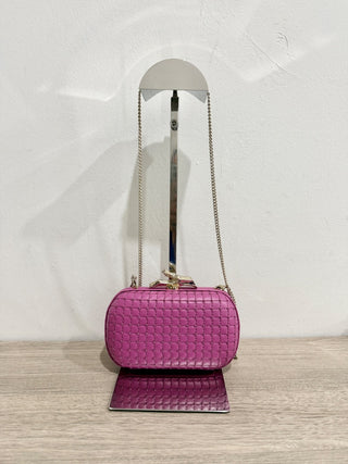 Diane von Furstenberg leather clutch with gold hardware