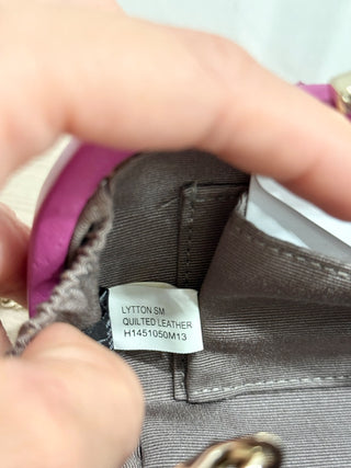 Diane von Furstenberg leather clutch with gold hardware