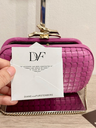 Diane von Furstenberg leather clutch with gold hardware