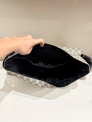 Gucci large monogram diaper changing bag