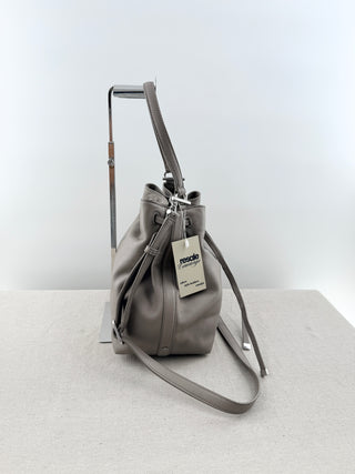 Tory Burch Gray bucket bag with top handle strap and cross body strap