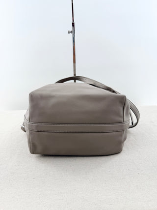 Tory Burch Gray bucket bag with top handle strap and cross body strap
