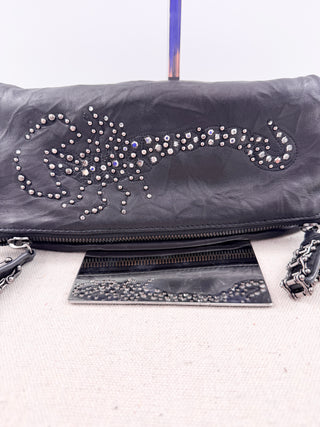 Thomas Wylde leather clutch bag with embellished scorpion design