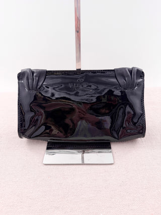 Valentino patent leather clutch bag with leather bow