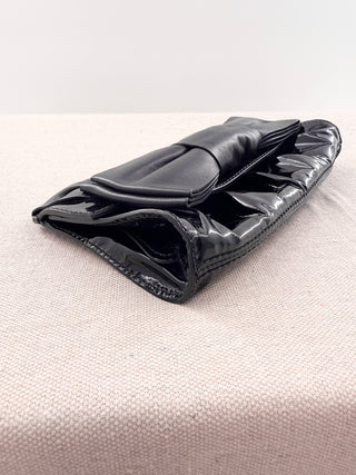 Valentino patent leather clutch bag with leather bow