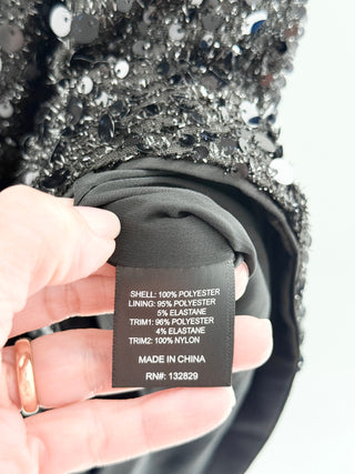 NBD mini dress featuring one shoulder silhouette with asymmetrical neckline and single long sleeve in fully sequin-embellished fabric, M